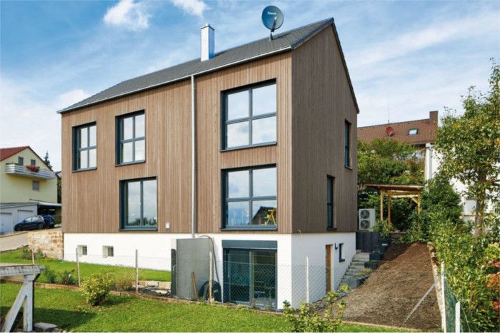 Holzhaus in Massivbauweise mit Holzverschalung gebaut von Rems-Murr-Holzhaus
